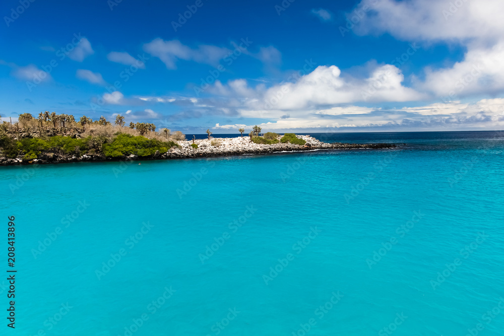 Crystal-clear turquoise water in the Santa Fe Island cove