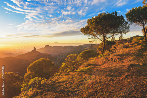 Landscape of an incredible sunset in the mountains of the Canary Islands. with its forests, valleys and trees. photo