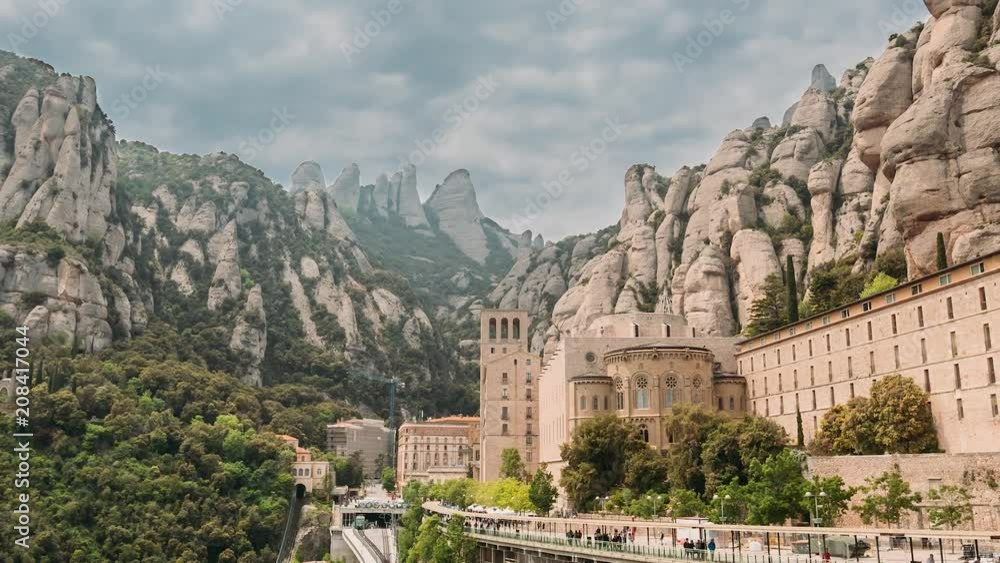 Catalonia, Spain. Santa Maria De Montserrat. Benedictine Abbey In Mountain Of Montserrat, In Monistrol De Montserrat, In Catalonia, Spain. Timelapse, Time-lapse Catalonia, Spain. Santa Maria De Montserrat. Benedictine Abbey In Mountain Of Montserrat, In Monistrol De Montserrat, In Catalonia, Spain. Timelapse, Time-lapse