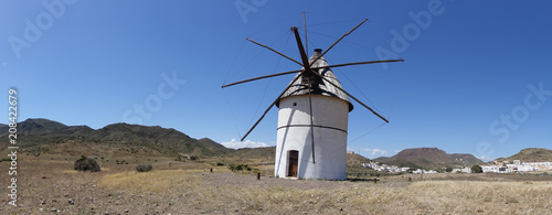 Windmill under blue sky in Almeria, Andalucia