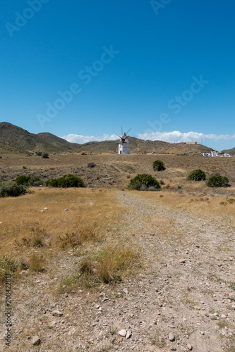 Windmill under blue sky in Almeria  Andalucia