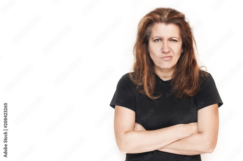 Beautiful woman on a white background with irritated hair and an angry face. It can be seen that a woman is good, but for some reason is angry - may her husband. Isolated Beautiful woman on a white background with irritated hair and an angry face. It can be seen that a woman is good, but for some reason is angry - may her husband. Isolated