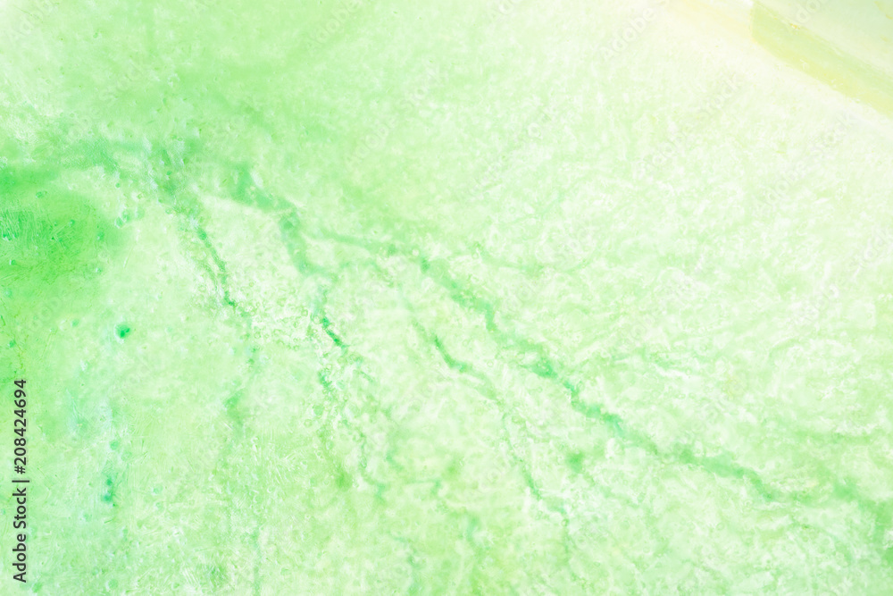 Colorful green ice texture with diagonal lines Colorful green ice texture with diagonal lines