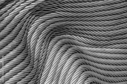Pattern of a tightly folded new steel cable arranged in a wave-like parallel arrangement