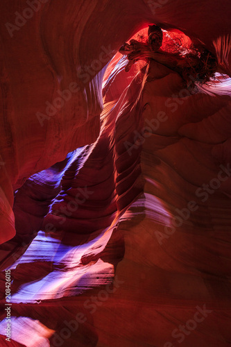 Beautiful wide angle view of amazing sandstone formations in famous Antelope Canyon on a sunny day with blue sky near the old town of Page at Lake Powell, American Southwest, Arizona, USA
