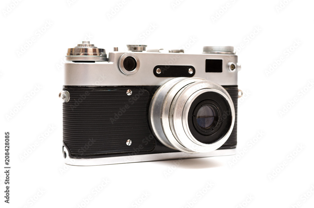 Vintage film photo camera isolated on white background.
