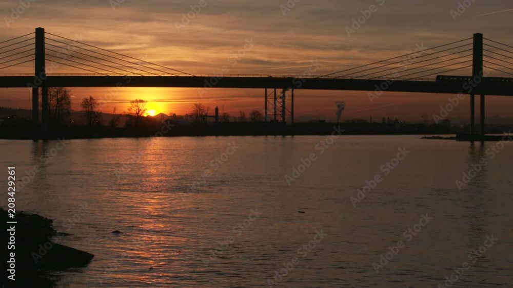 Sunrise Rail Commuters Vancouver 4K UHD. Morning Commuters cross a river bridge at sunrise. Vancouver, Fraser River 4K UHD
Sunrise Rail Commuters Vancouver 4K UHD. Morning Commuters cross a river bridge at sunrise. Vancouver, Fraser River 4K UHD