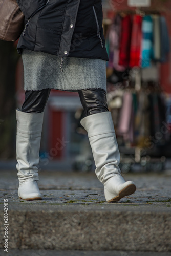 Womans white overknee boots. © C@rsten