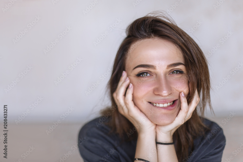 Close-up portrait of beautiful, fresh, healthy and sensual girl. Portrait of smiling girl Close-up portrait of beautiful, fresh, healthy and sensual girl. Portrait of smiling girl