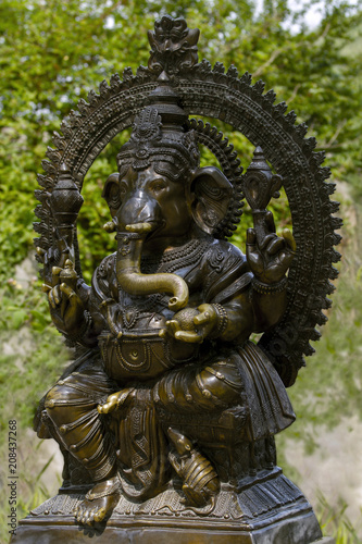 Brass statue of the Hindu God Ganesha. The Hindu god of wisdom, wisdom and prosperity of Ganesha. 