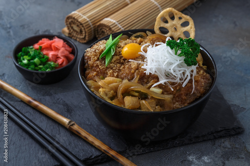 Katsudon rice topped with fried pork, japanese cuisine photo