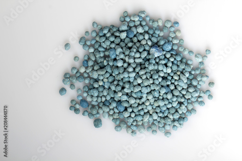 Heap of mineral fertilizers, isolated on the white background