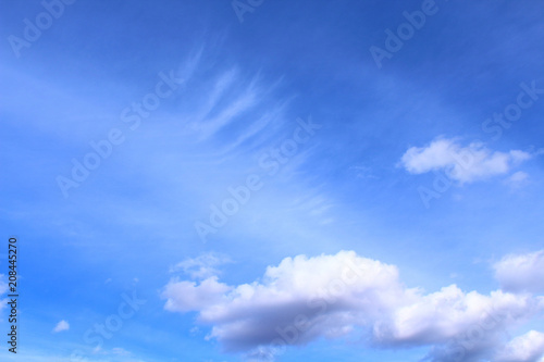 Beautiful blue sky and beautiful white cirrus and cumulus clouds. Landscape. Background.