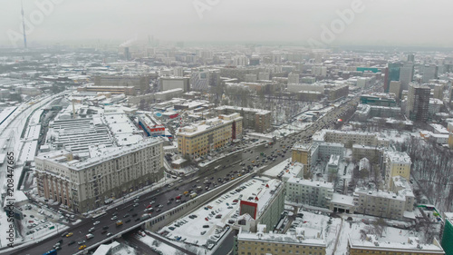 Moscow cloudy day aerial shot above high load traffic cross junction. 
