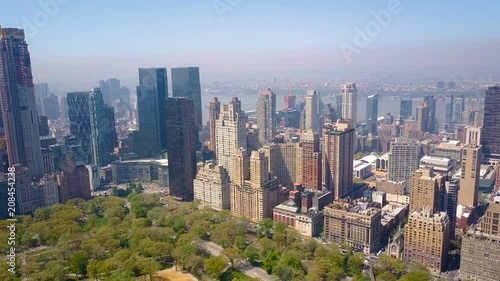 Aerial view of Central Park, New York, USA, Skyscrapers on background. Luxury residential buildings.