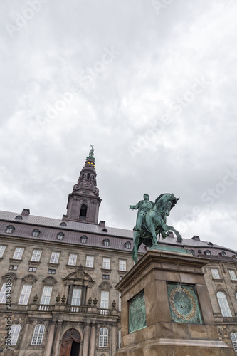 Portrait view of Frederik VII and Christiansborg Palace in Copenhagen, Denmark.