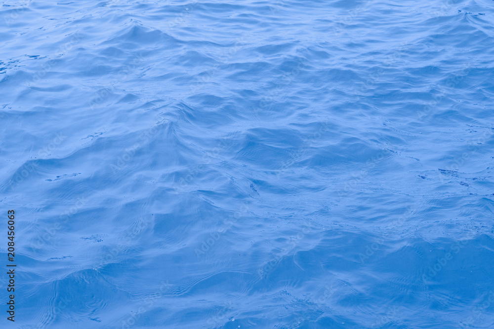 close up ocean water background , blue water ripples texture close up ocean water background , blue water ripples texture
