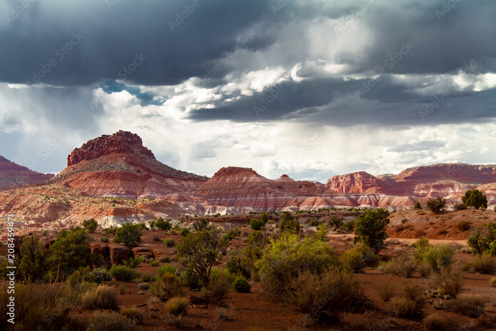 Magnificent stormy view of the colorful sandstone rock formations of Grand Staircase-Escalante in Paria, Utah USA.