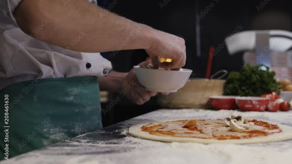Pizza Maker Prepares Pizza In The Kitchen Of The Restaurant. Shot on Red Helium 8K Pizza Maker Prepares Pizza In The Kitchen Of The Restaurant. Shot on Red Helium 8K