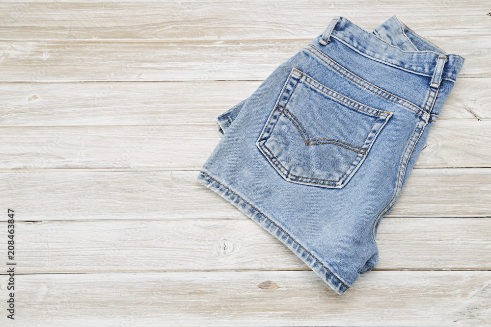 Short Denim on rustic white wooden Table Short Denim on rustic white wooden Table