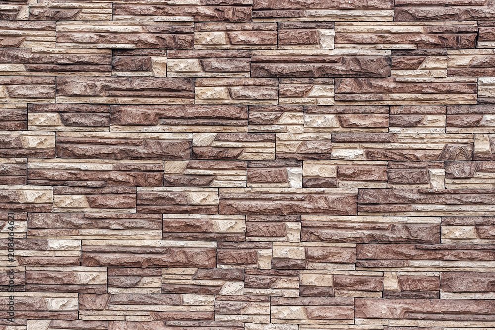 Decorative brown wall artificial torn stone background, texture. Decorative brown wall artificial torn stone background, texture.