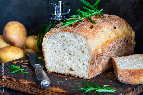 Fotografía Home baked potato bread on rustic wooden table