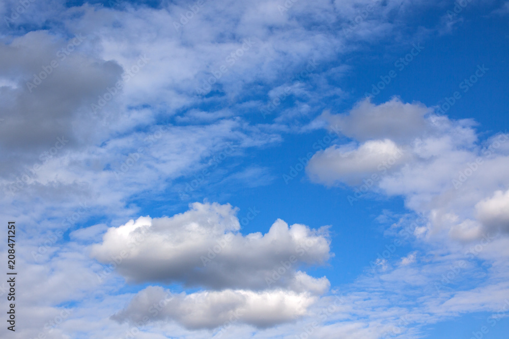 Obraz premium Dark clouds on a blue sky