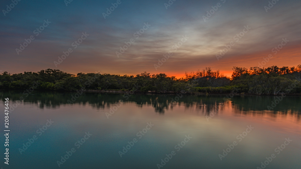 Nature's Reflections at Sunrise