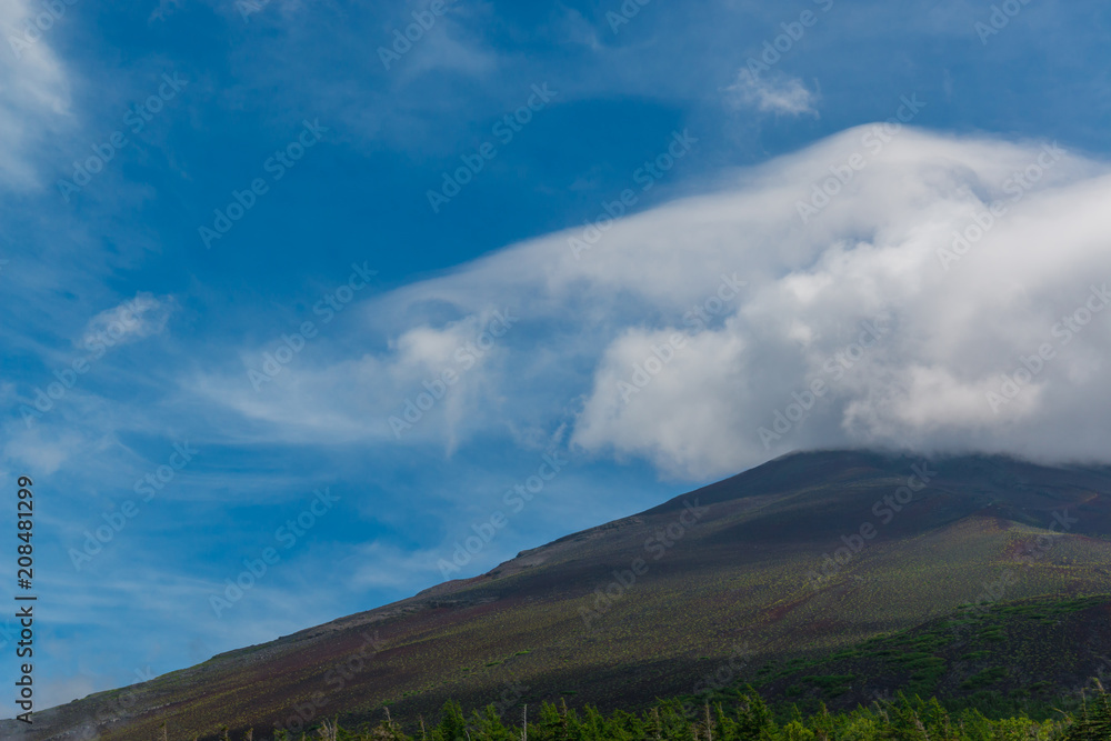 Fototapeta premium Mt. fuji in summer without snow and cloudy sky.