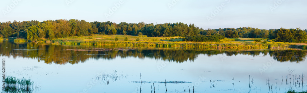 Evening summer lake landscape. Evening summer lake landscape.