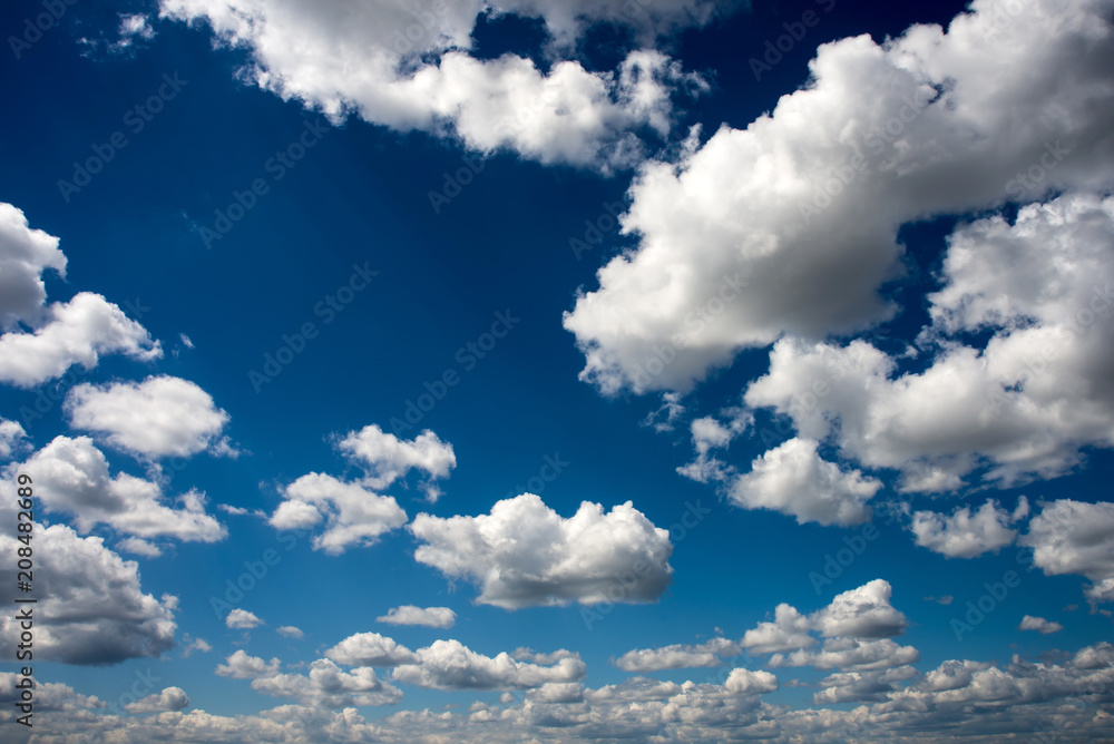 big, white, beautiful clouds in the blue sky on a Sunny day big, white, beautiful clouds in the blue sky on a Sunny day