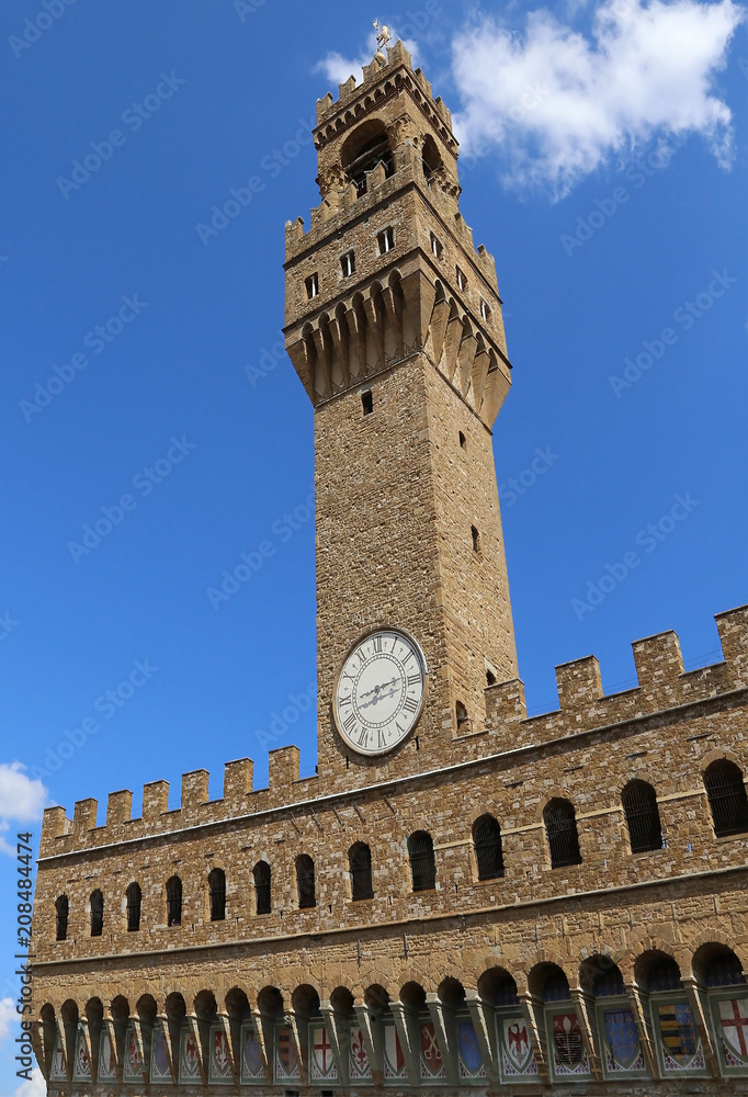 Florence in Italy Old Palace and clock tower with blue skyy