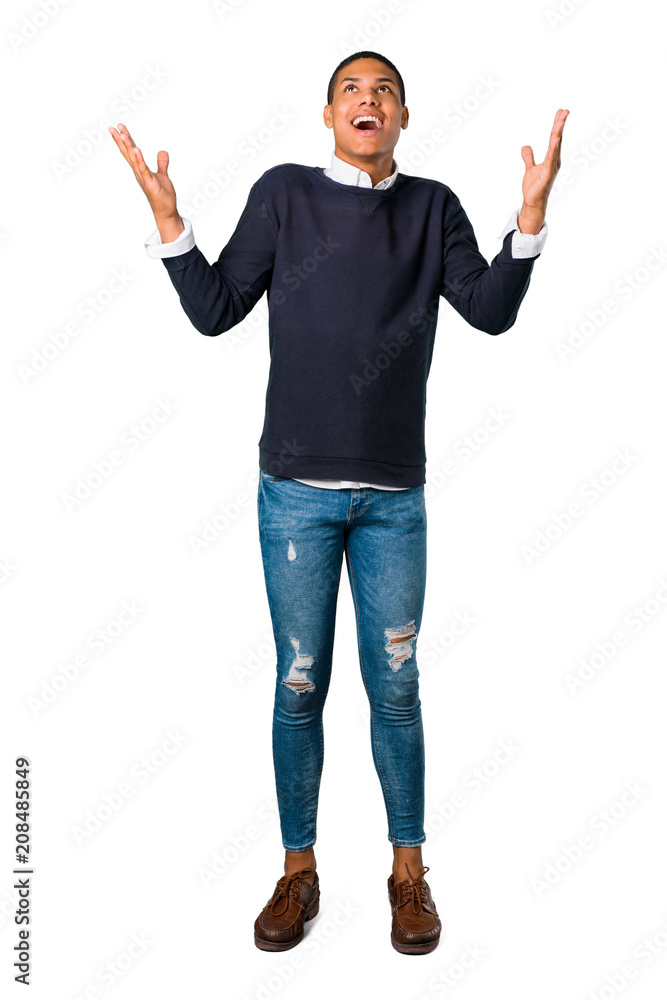 Young african american man with surprise and shocked facial expression. Mouth open because not expect what has happened on isolated white background Young african american man with surprise and shocked facial expression. Mouth open because not expect what has happened on isolated white background
