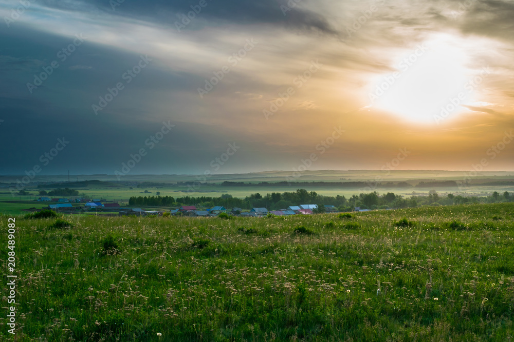 Spring dawn over the Russian village