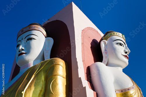 Seated Buddhas at Kyaik Pun Pagoda, Myanmar photo