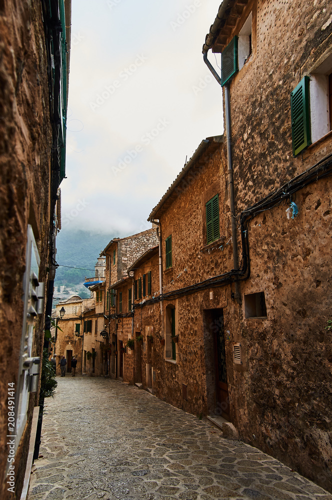 Small street in Valldemossa. Mallorca, Spain. Small mediterranean village.