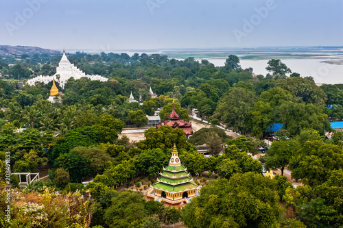 фотографія A scenic view of the Hsinbyume Pagoda and Irrawaddy River from the Mingun Stupa,