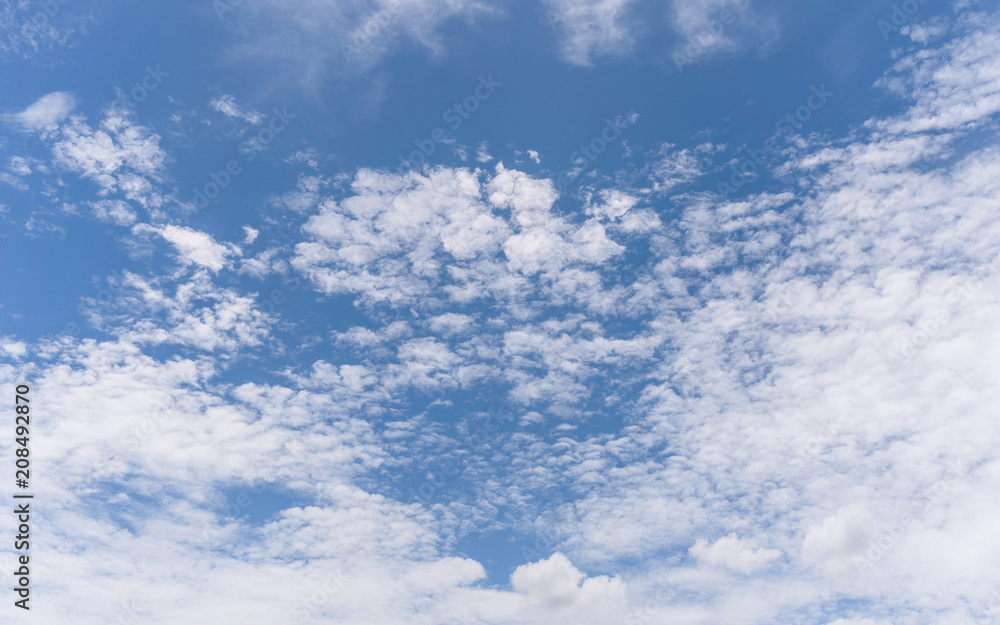 Naklejka premium Blue sky background with clouds