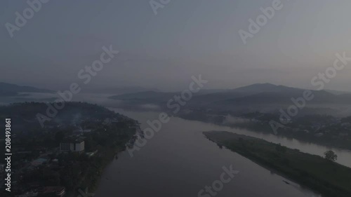 Aerial view of Mekong river between Chiang Khong, a small town in Chiang Rai Province, Northern Thailand and Houay Xai, the capital of the Laos province of Bokeo photo