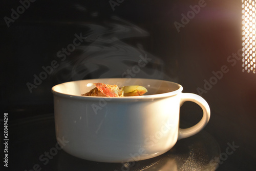 Look inside the microwave food white bowl, In a warm atmosphere . - Non color ceramic applicable to available with microwave.