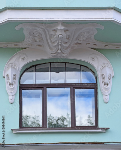 Window with a decor in the merchant's house of merchant Yakov Filatov. The building was built in 1907 1909 by architects VA Dubovsky and NA Arkhipov. Russia, Moscow, May 2018 photo