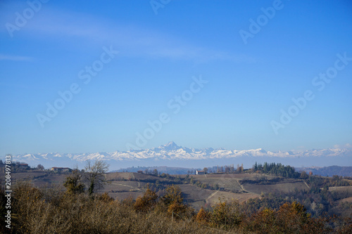 The ridge of the Monviso seen from the Langhe