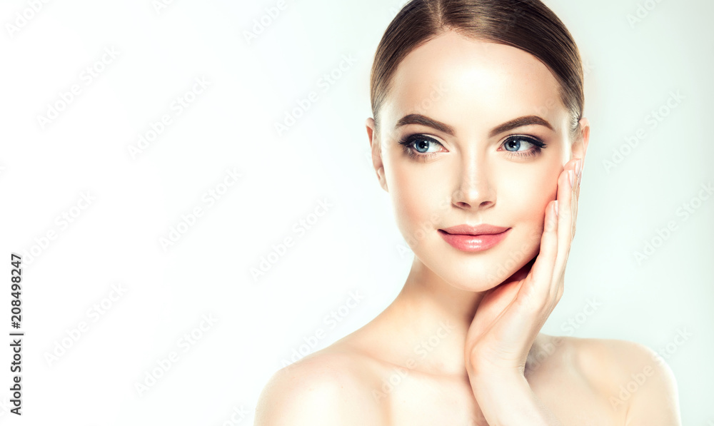 Beautiful Young Woman with Clean Fresh Skin look away .Girl beauty face care. Facial treatment . Cosmetology , beauty and spa .
Beautiful Young Woman with Clean Fresh Skin look away .Girl beauty face care. Facial treatment . Cosmetology , beauty and spa .