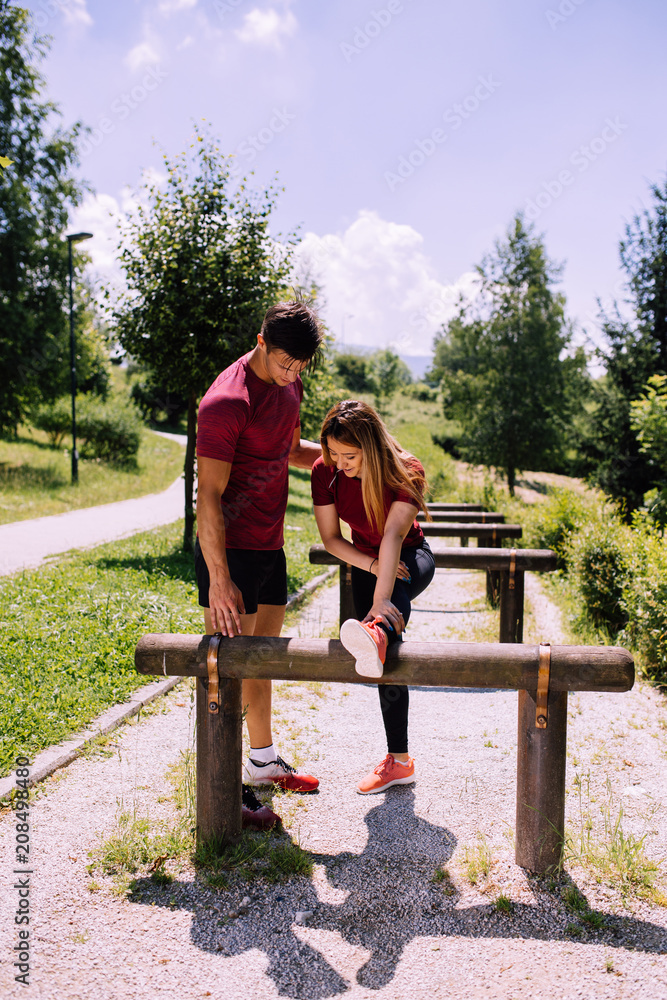 Young fitness couple outdoor exercise Young fitness couple outdoor exercise