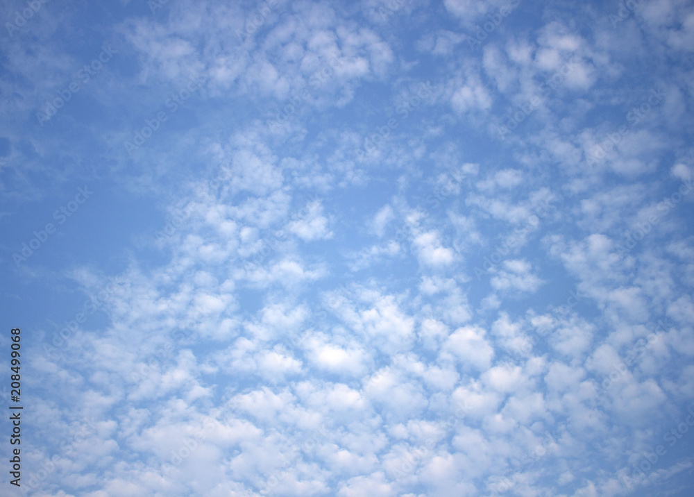 Light blue sky with clouds background Light blue sky with clouds background