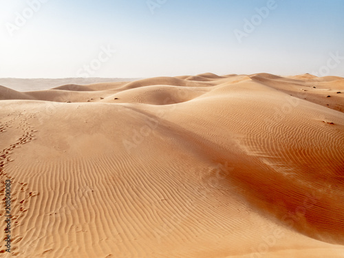 The dunes of the Wahiba Sands desert in Oman at sunset during a typical summer sand storm - 6 © gdefilip