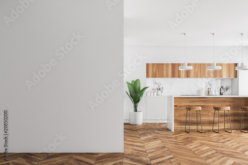 Fototapeta Naklejka Na Ścianę i Meble -  Wooden bar in a white kitchen, mock up wall
