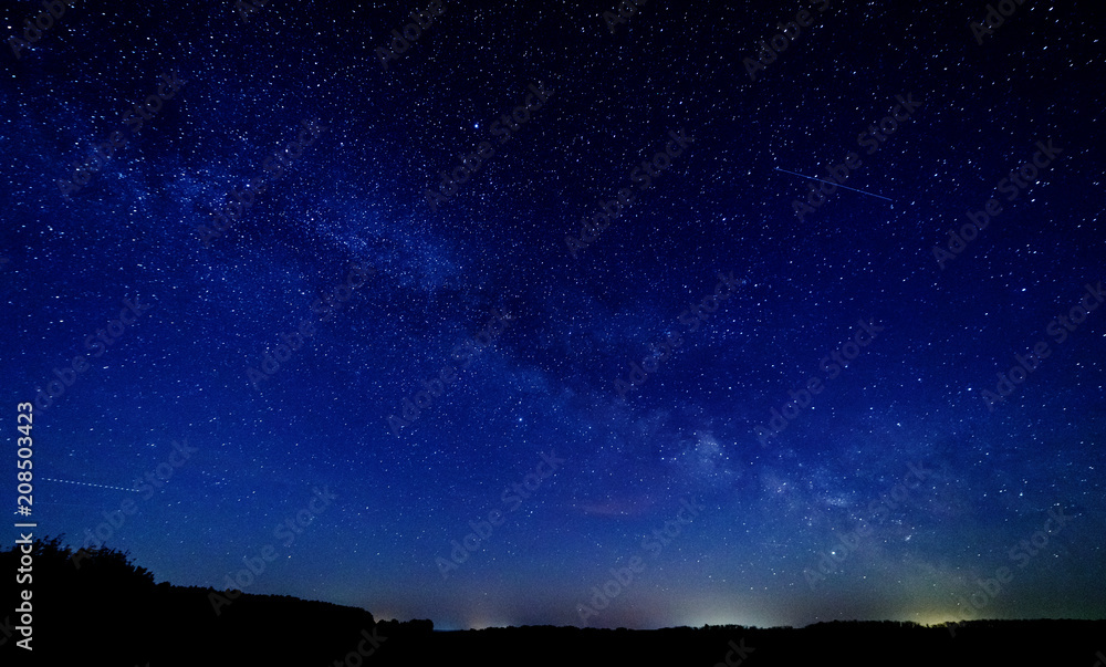 The milky way and the stars above the horizon.