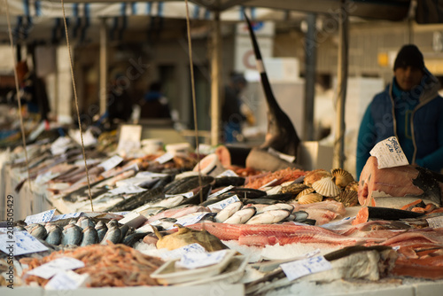 Open-air Saturday morning fish market in Udine city, Friuli Venezia Giulia, Italy.