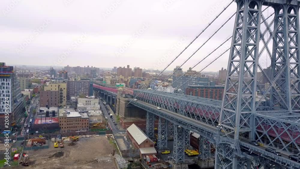 New York City skyline aerial of East River and Williamsburg Bridge drone shot. New York City skyline aerial of East River and Williamsburg Bridge drone shot.